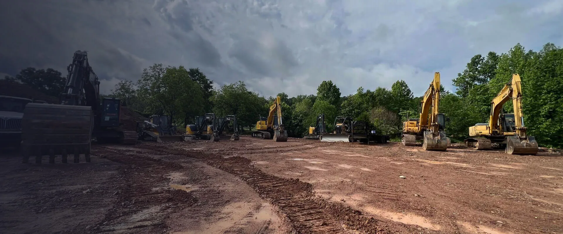 Fleet of excavators on site